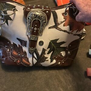 Brown and white purse.